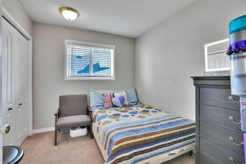 7237 Laguna Way Ne, Calgary, AB - Indoor Photo Showing Bedroom