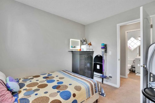 7237 Laguna Way Ne, Calgary, AB - Indoor Photo Showing Bedroom