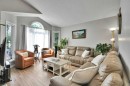 7237 Laguna Way Ne, Calgary, AB  - Indoor Photo Showing Living Room 