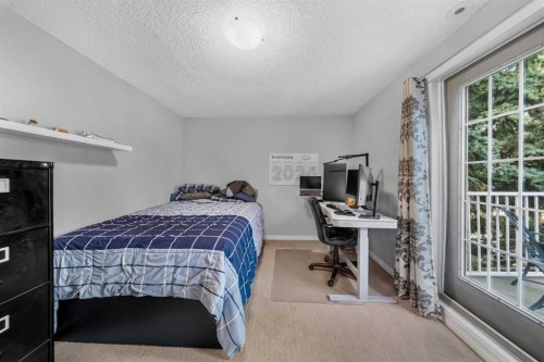 501 Patterson View Sw, Calgary, AB - Indoor Photo Showing Bedroom