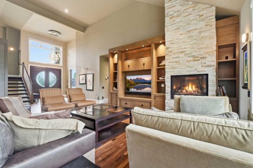 120 Lynx Ridge Road Nw, Calgary, AB - Indoor Photo Showing Living Room With Fireplace
