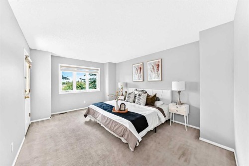 76-388 Sandarac Drive Nw, Calgary, AB - Indoor Photo Showing Bedroom