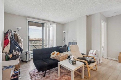 1408-1111 6 Avenue Sw, Calgary, AB - Indoor Photo Showing Living Room