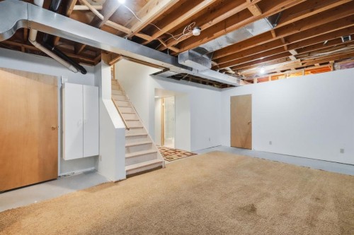61 Shannon Crescent Sw, Calgary, AB - Indoor Photo Showing Basement