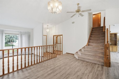 61 Shannon Crescent Sw, Calgary, AB - Indoor Photo Showing Other Room