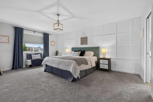 21 Morningside Bay Sw, Airdrie, AB - Indoor Photo Showing Bedroom