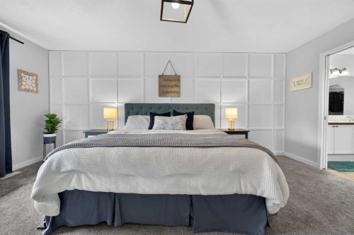 21 Morningside Bay Sw, Airdrie, AB - Indoor Photo Showing Bedroom