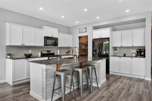 21 Morningside Bay Sw, Airdrie, AB - Indoor Photo Showing Kitchen With Upgraded Kitchen