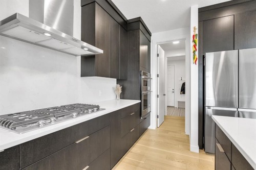 406 Rowley Way Nw, Calgary, AB - Indoor Photo Showing Kitchen With Upgraded Kitchen