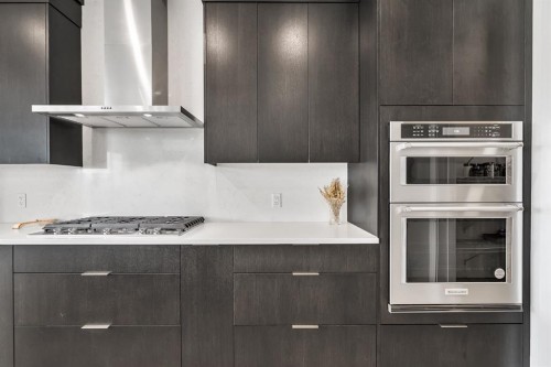406 Rowley Way Nw, Calgary, AB - Indoor Photo Showing Kitchen With Upgraded Kitchen