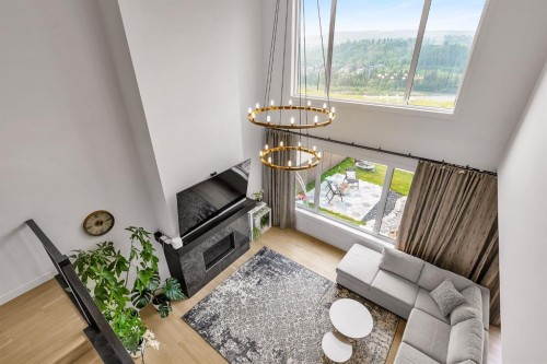 406 Rowley Way Nw, Calgary, AB - Indoor With Fireplace