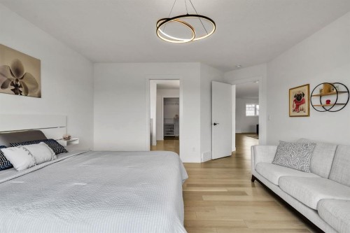 406 Rowley Way Nw, Calgary, AB - Indoor Photo Showing Bedroom