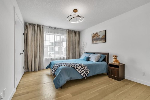 406 Rowley Way Nw, Calgary, AB - Indoor Photo Showing Bedroom
