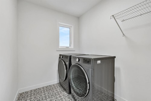 406 Rowley Way Nw, Calgary, AB - Indoor Photo Showing Laundry Room