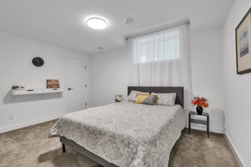 406 Rowley Way Nw, Calgary, AB - Indoor Photo Showing Bedroom