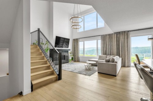 406 Rowley Way Nw, Calgary, AB - Indoor Photo Showing Other Room With Fireplace