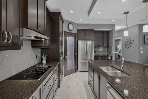 139 Nolanshire Point Nw, Calgary, AB - Indoor Photo Showing Kitchen With Stainless Steel Kitchen With Double Sink With Upgraded Kitchen
