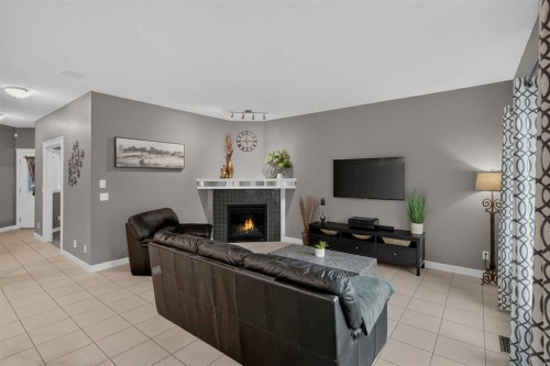 139 Nolanshire Point Nw, Calgary, AB - Indoor Photo Showing Living Room With Fireplace