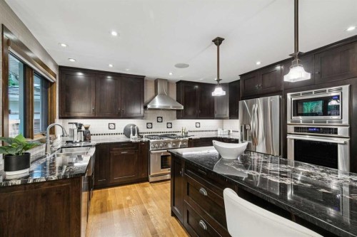 23 Bay View Drive Sw, Calgary, AB - Indoor Photo Showing Kitchen With Stainless Steel Kitchen
