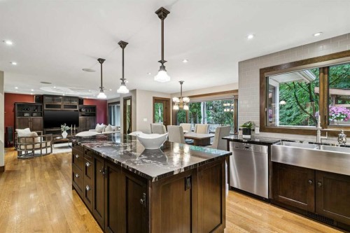 23 Bay View Drive Sw, Calgary, AB - Indoor Photo Showing Kitchen With Double Sink With Upgraded Kitchen