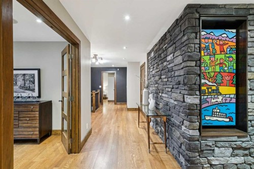 23 Bay View Drive Sw, Calgary, AB - Indoor Photo Showing Other Room With Fireplace