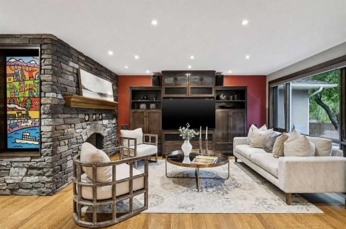23 Bay View Drive Sw, Calgary, AB - Indoor Photo Showing Living Room With Fireplace