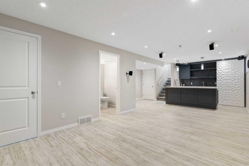 16 Fireside Way, Cochrane, AB - Indoor Photo Showing Other Room