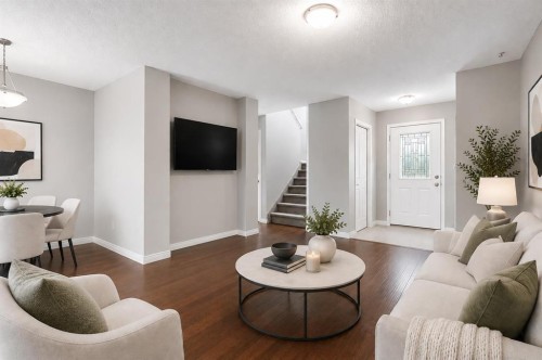 16 Fireside Way, Cochrane, AB - Indoor Photo Showing Living Room