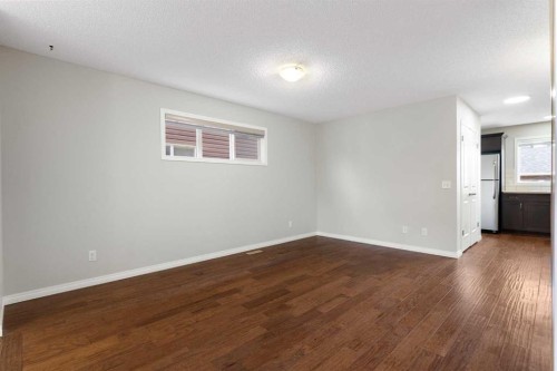 16 Fireside Way, Cochrane, AB - Indoor Photo Showing Other Room