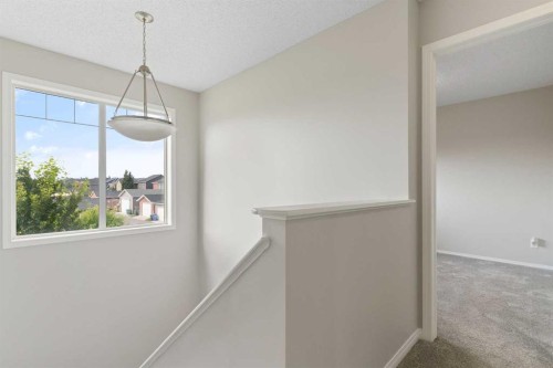 16 Fireside Way, Cochrane, AB - Indoor Photo Showing Other Room