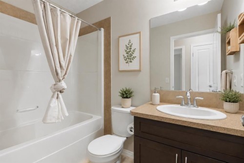 16 Fireside Way, Cochrane, AB - Indoor Photo Showing Bathroom