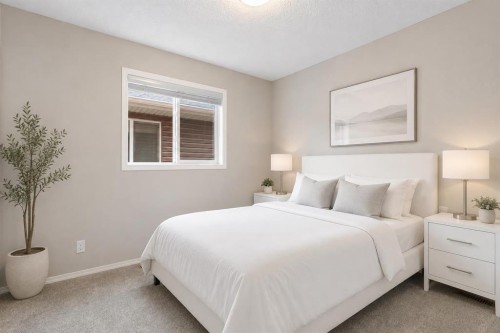 16 Fireside Way, Cochrane, AB - Indoor Photo Showing Bedroom