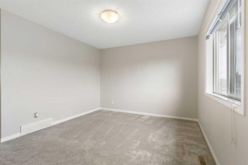 16 Fireside Way, Cochrane, AB - Indoor Photo Showing Other Room