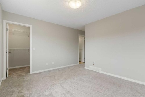 16 Fireside Way, Cochrane, AB - Indoor Photo Showing Other Room