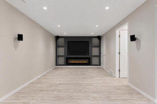 16 Fireside Way, Cochrane, AB - Indoor Photo Showing Other Room