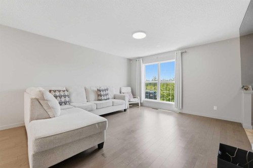 334 Legacy Village Way Se, Calgary, AB - Indoor Photo Showing Living Room
