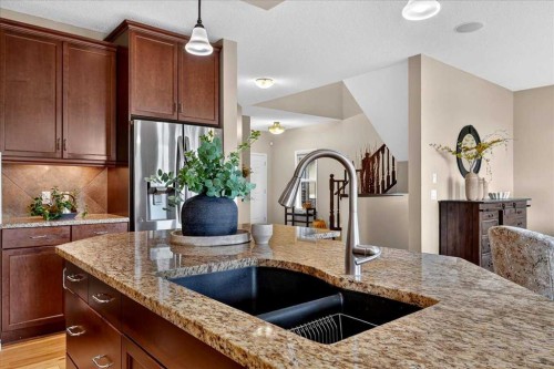 174 Cranridge Terrace Se, Calgary, AB - Indoor Photo Showing Kitchen With Double Sink