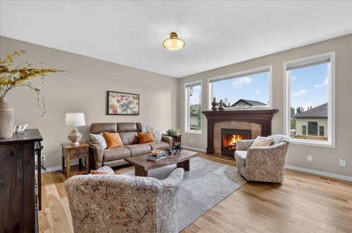 174 Cranridge Terrace Se, Calgary, AB - Indoor Photo Showing Living Room With Fireplace