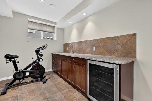174 Cranridge Terrace Se, Calgary, AB - Indoor Photo Showing Gym Room