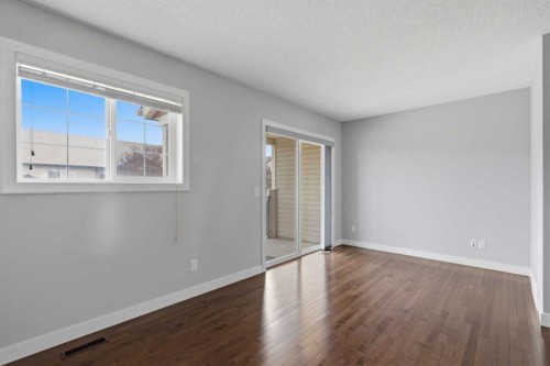 29 Pantego Lane Nw, Calgary, AB - Indoor Photo Showing Other Room
