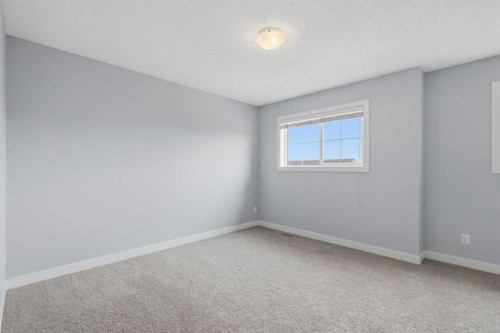 29 Pantego Lane Nw, Calgary, AB - Indoor Photo Showing Other Room