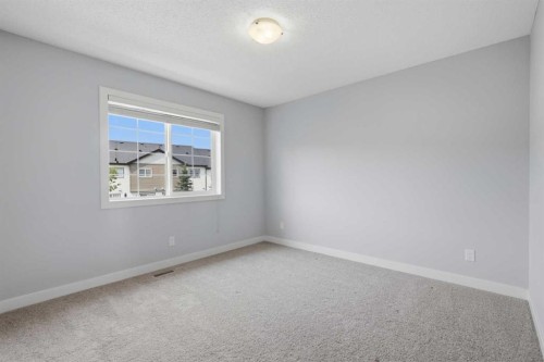 29 Pantego Lane Nw, Calgary, AB - Indoor Photo Showing Other Room