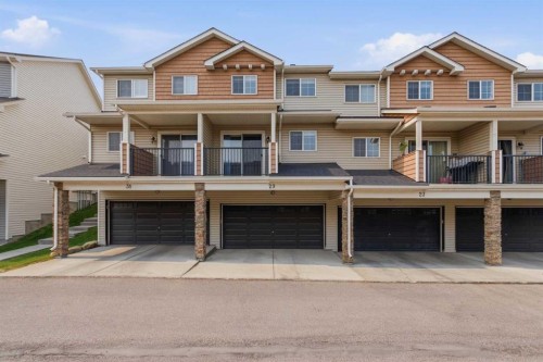 29 Pantego Lane Nw, Calgary, AB - Outdoor With Balcony With Facade