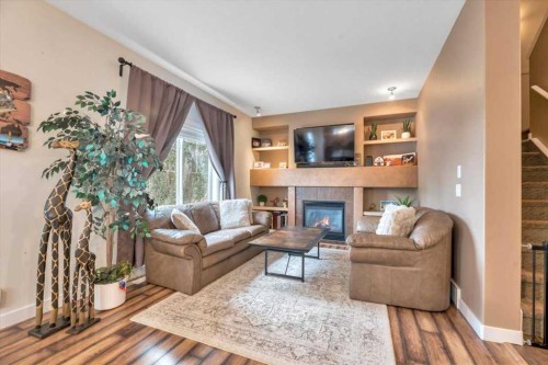 331 Ranch Ridge Meadow, Strathmore, AB - Indoor Photo Showing Living Room With Fireplace