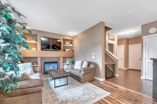 331 Ranch Ridge Meadow, Strathmore, AB - Indoor Photo Showing Living Room With Fireplace