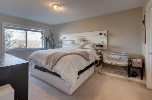 1203-211 Aspen Stone Boulevard Sw, Calgary, AB - Indoor Photo Showing Bedroom