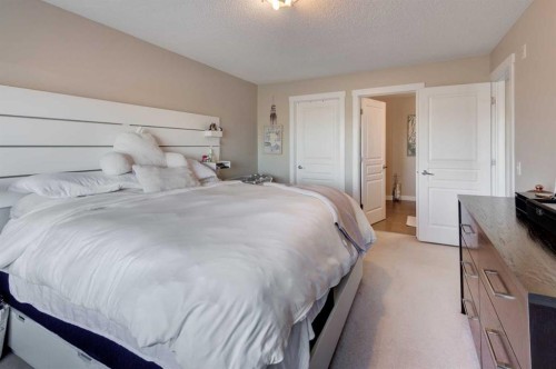 1203-211 Aspen Stone Boulevard Sw, Calgary, AB - Indoor Photo Showing Bedroom
