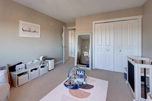 1203-211 Aspen Stone Boulevard Sw, Calgary, AB - Indoor Photo Showing Bedroom