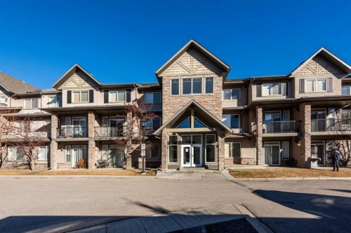 1203-211 Aspen Stone Boulevard Sw, Calgary, AB - Outdoor With Balcony With Facade
