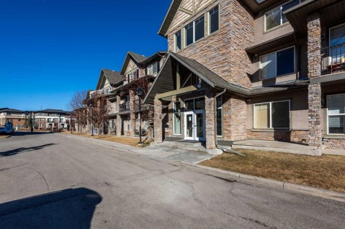 1203-211 Aspen Stone Boulevard Sw, Calgary, AB - Outdoor With Facade